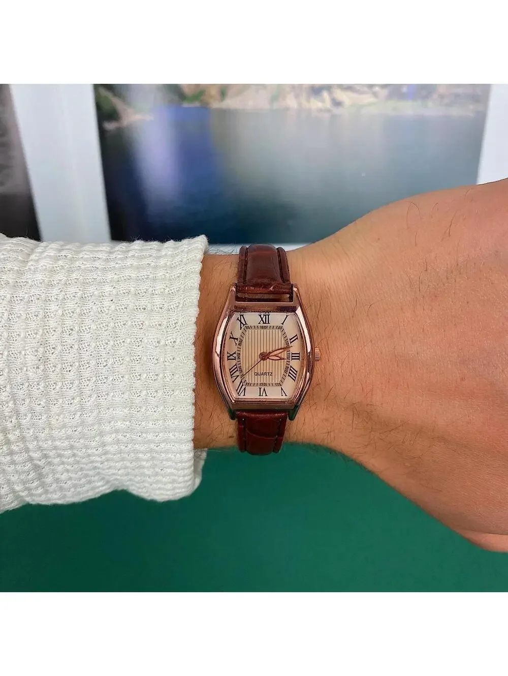 Minimalistic essential vintage style gold and leather style band watch. 9 inches